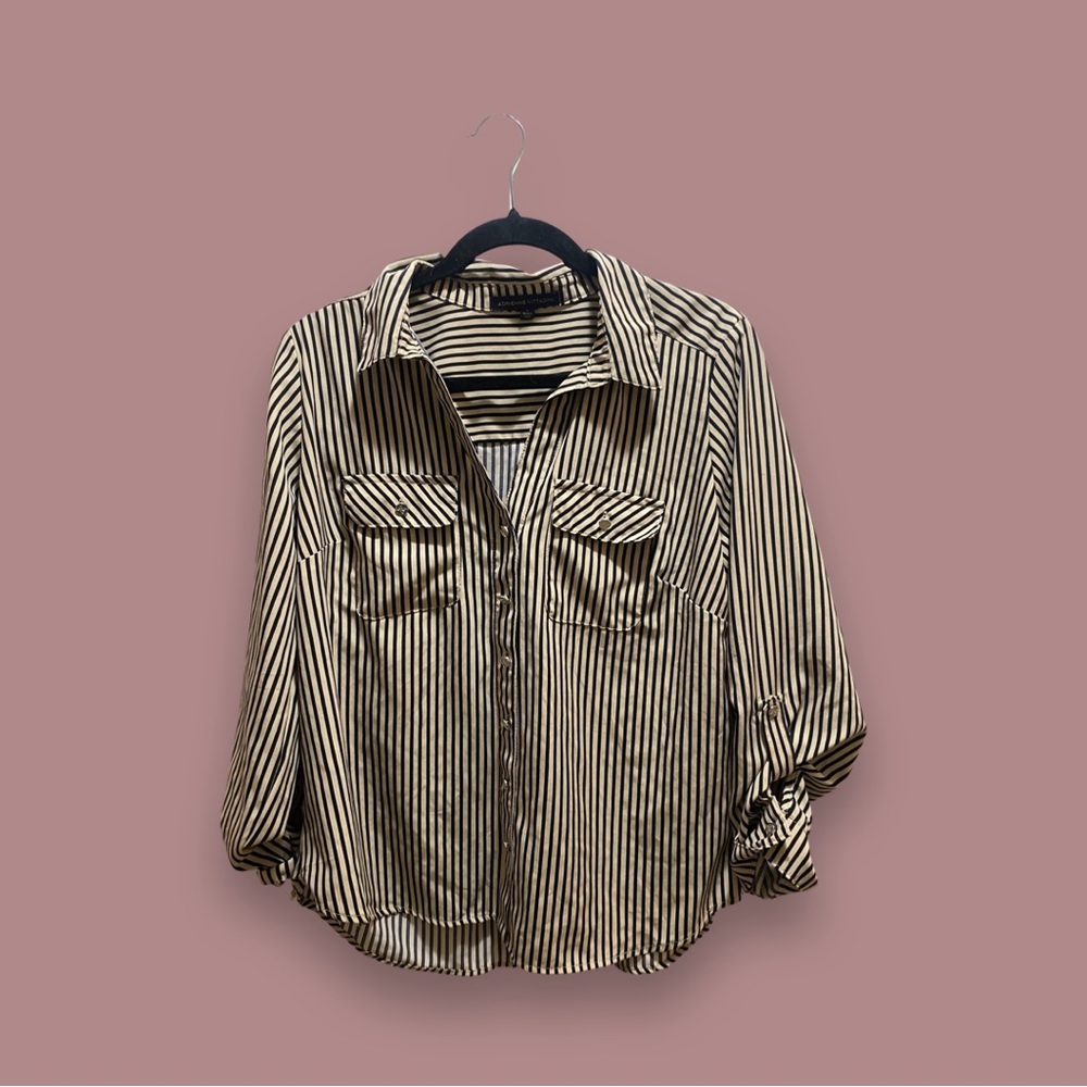 Woman’s striped button up blouse. This button up is super comfy and light weight